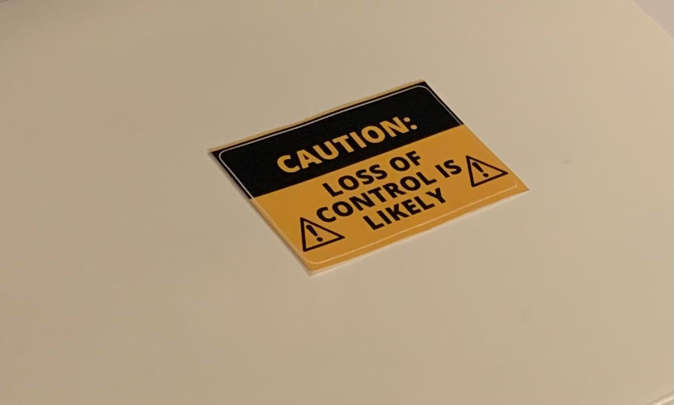 "CAUTION" Sticker