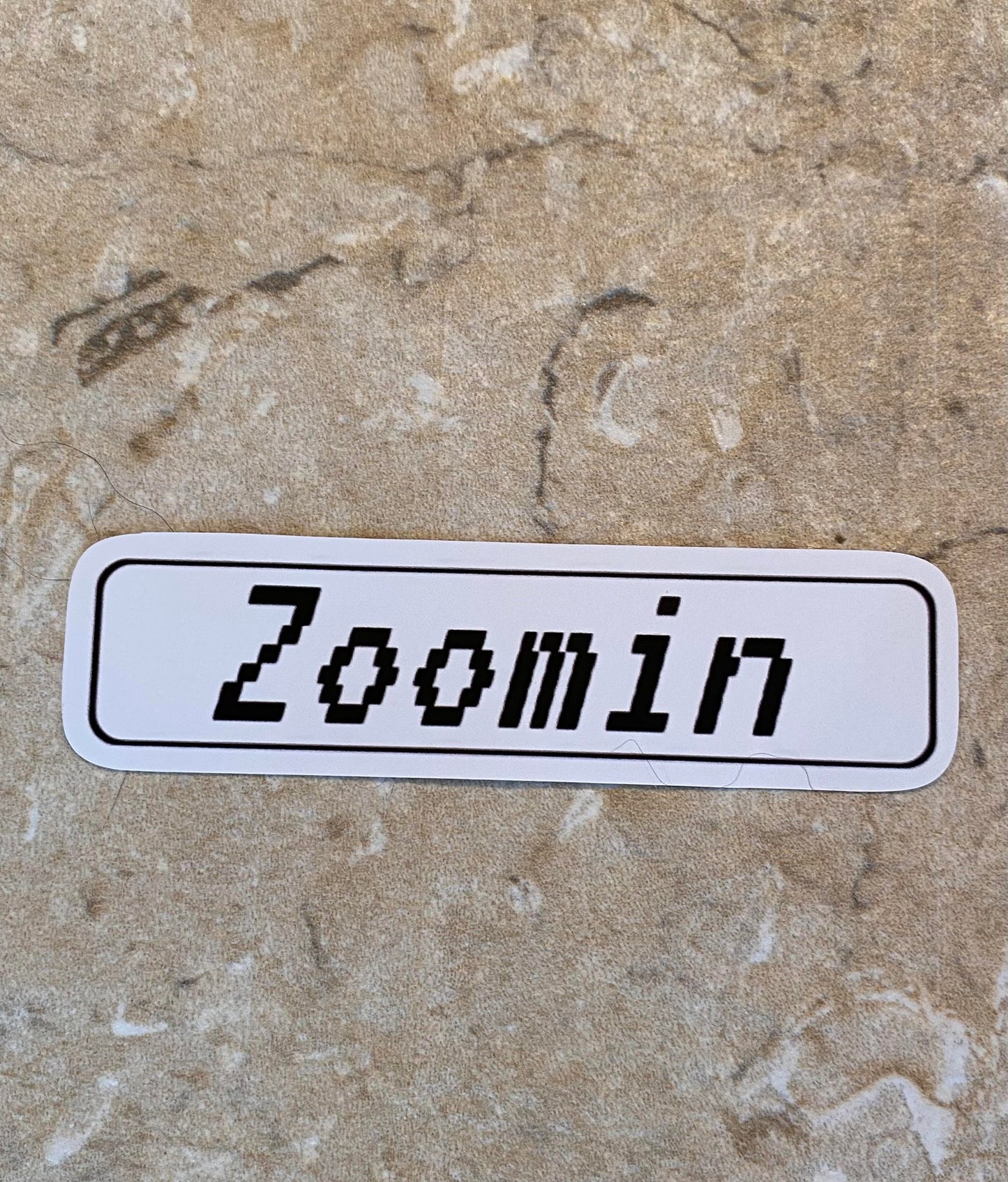 "Zoomin" Sticker