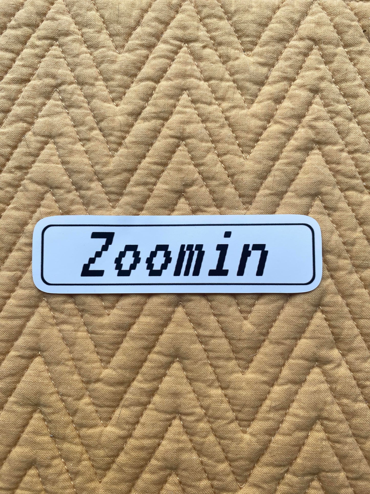 "Zoomin" Sticker